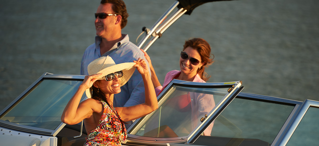 Three Close-up People Basking in the Sun on a Cobalt at Sunset