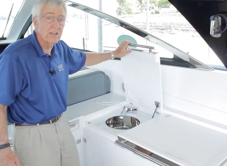 man showing boat features on the A40