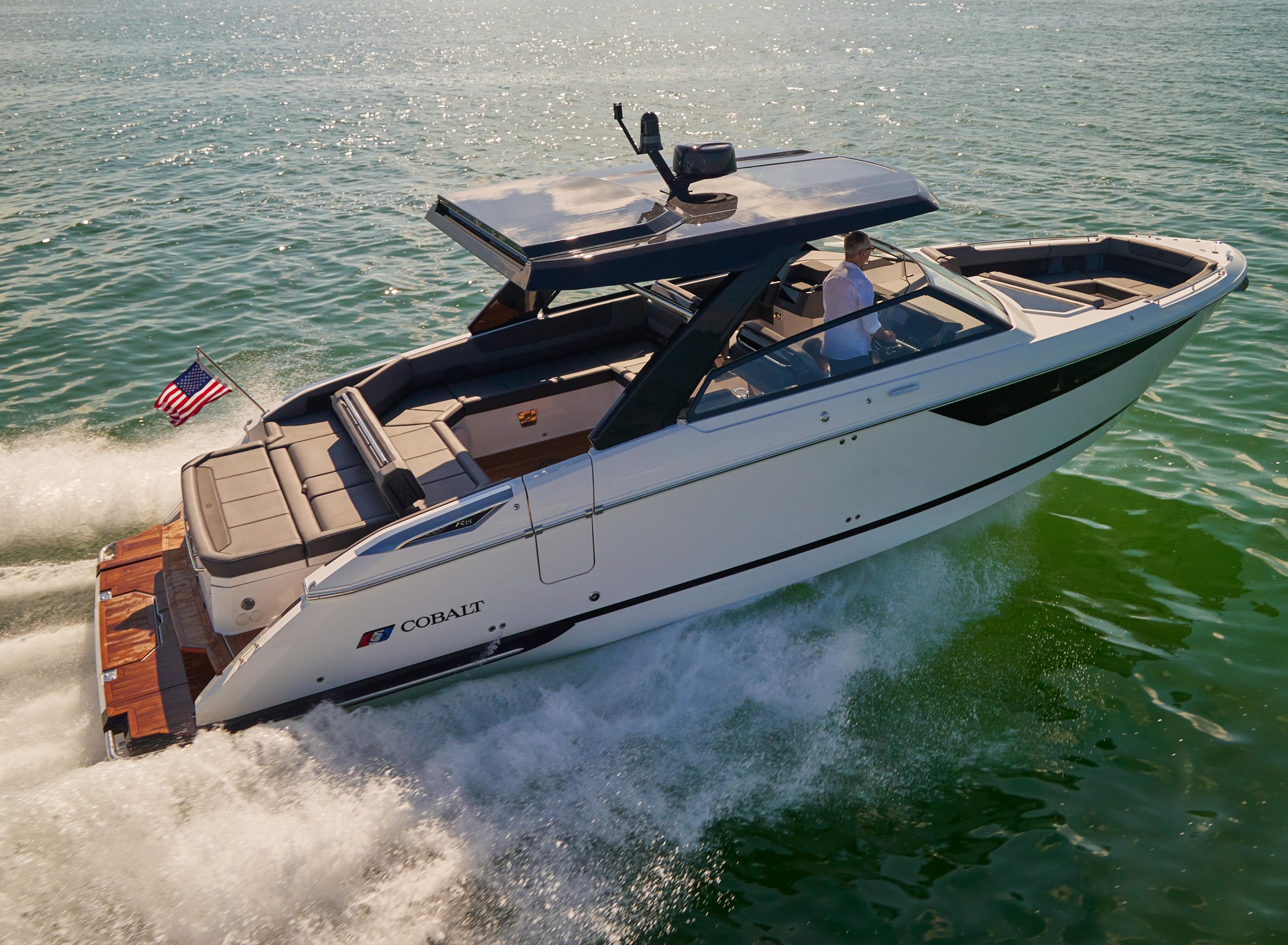 Cobalt boat showcasing high-performance hull design and speed on open water highlighting precision engineering and craftsmanship