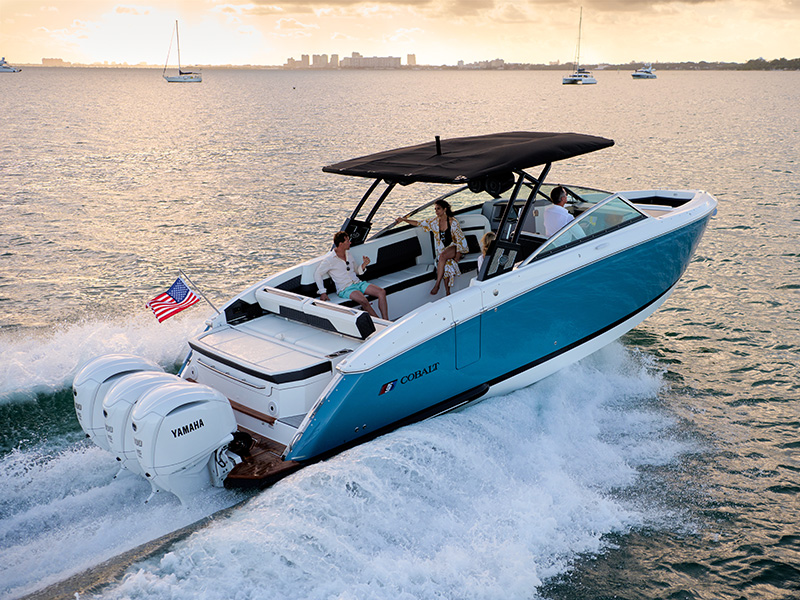 Cobalt R33 Coastal with triple Yamaha 300 V6 outboard engines viewed from stern on turquoise water