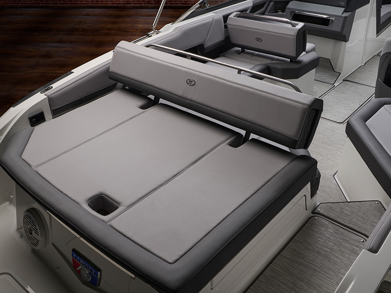 Cobalt R4 Sterndrive aft backrest with gray upholstered foldable lounge seating and Cobalt R4 badge