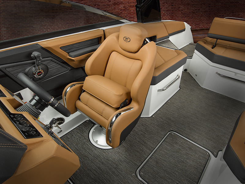 Cobalt R6 Sterndrive interior styling featuring tan leather helm seat with Cobalt logo and steering console