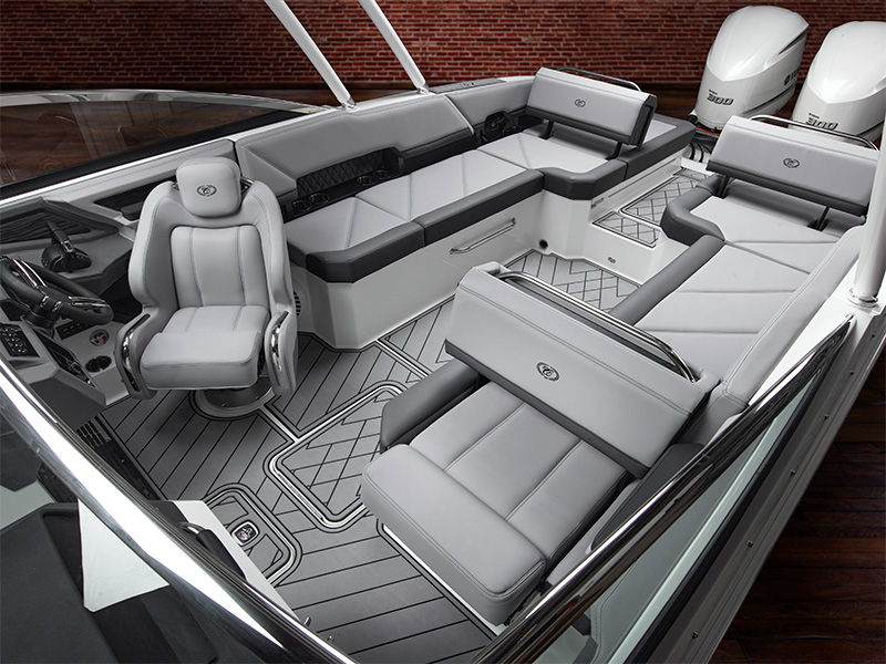 Cobalt R8 Coastal Fresco Chill upholstery with light gray premium seating throughout interior and aft lounge area
