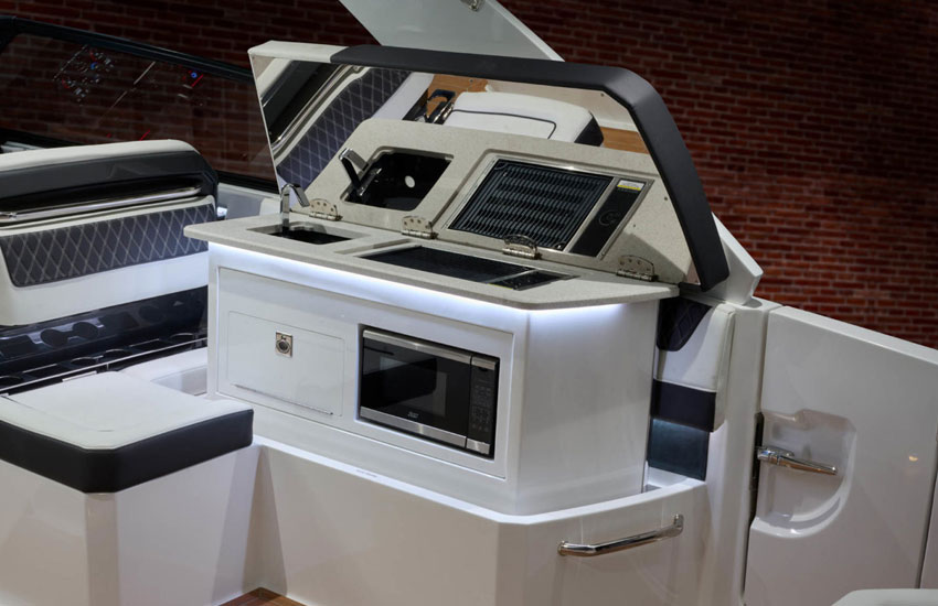 A first for bowriders, the patent-pending Cobalt AutoDeploy Galley sets the Cobalt R35 apart from other bowrider boats