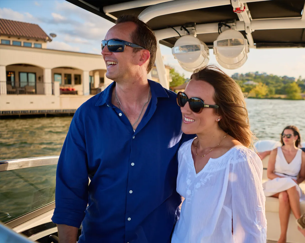couple on a Cobalt boat