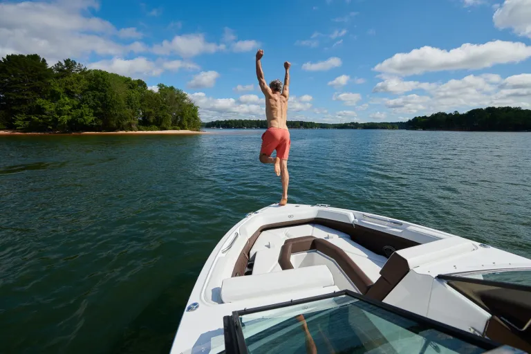 person jumping in water