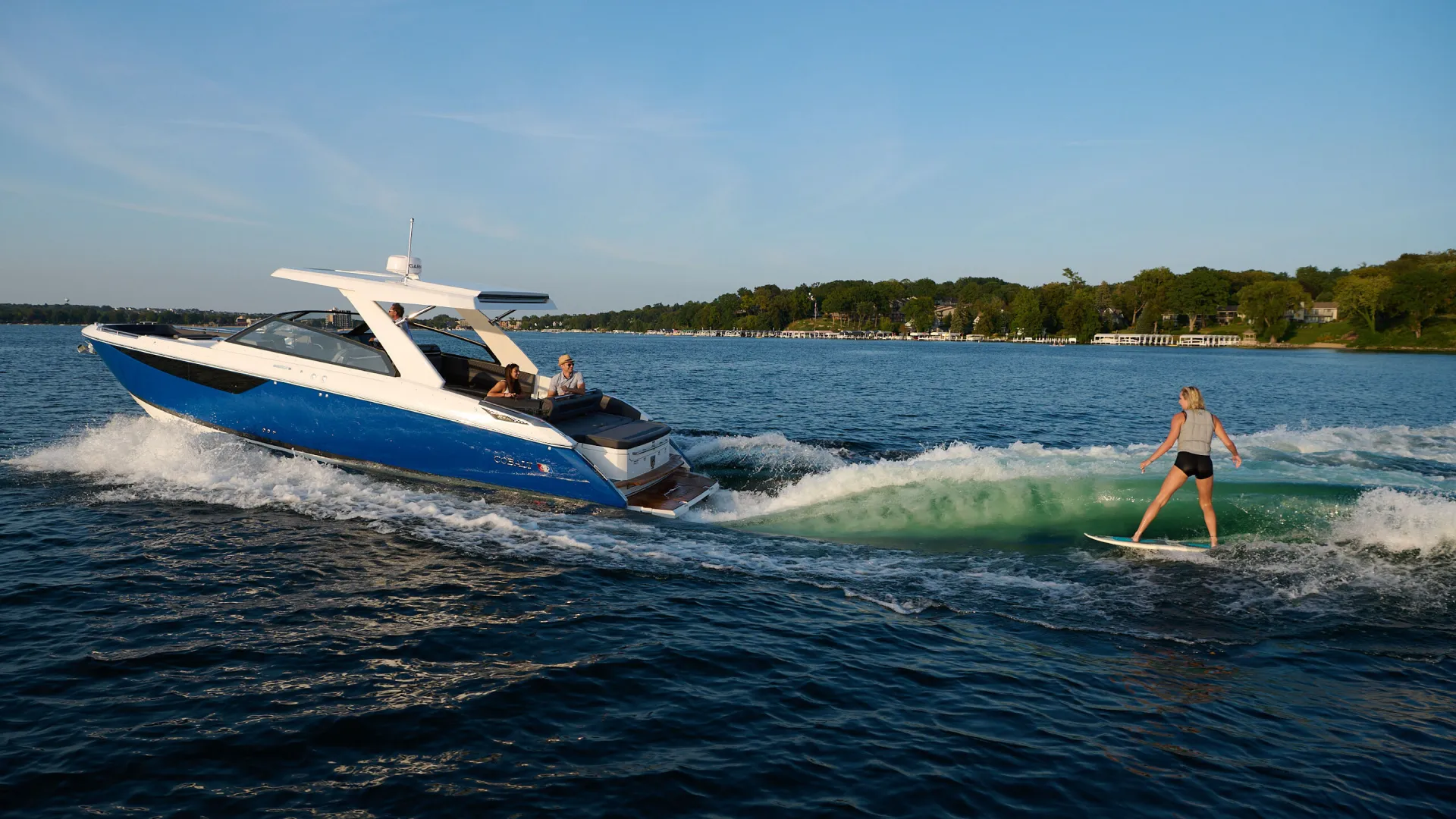 wakesurfer behind a boat