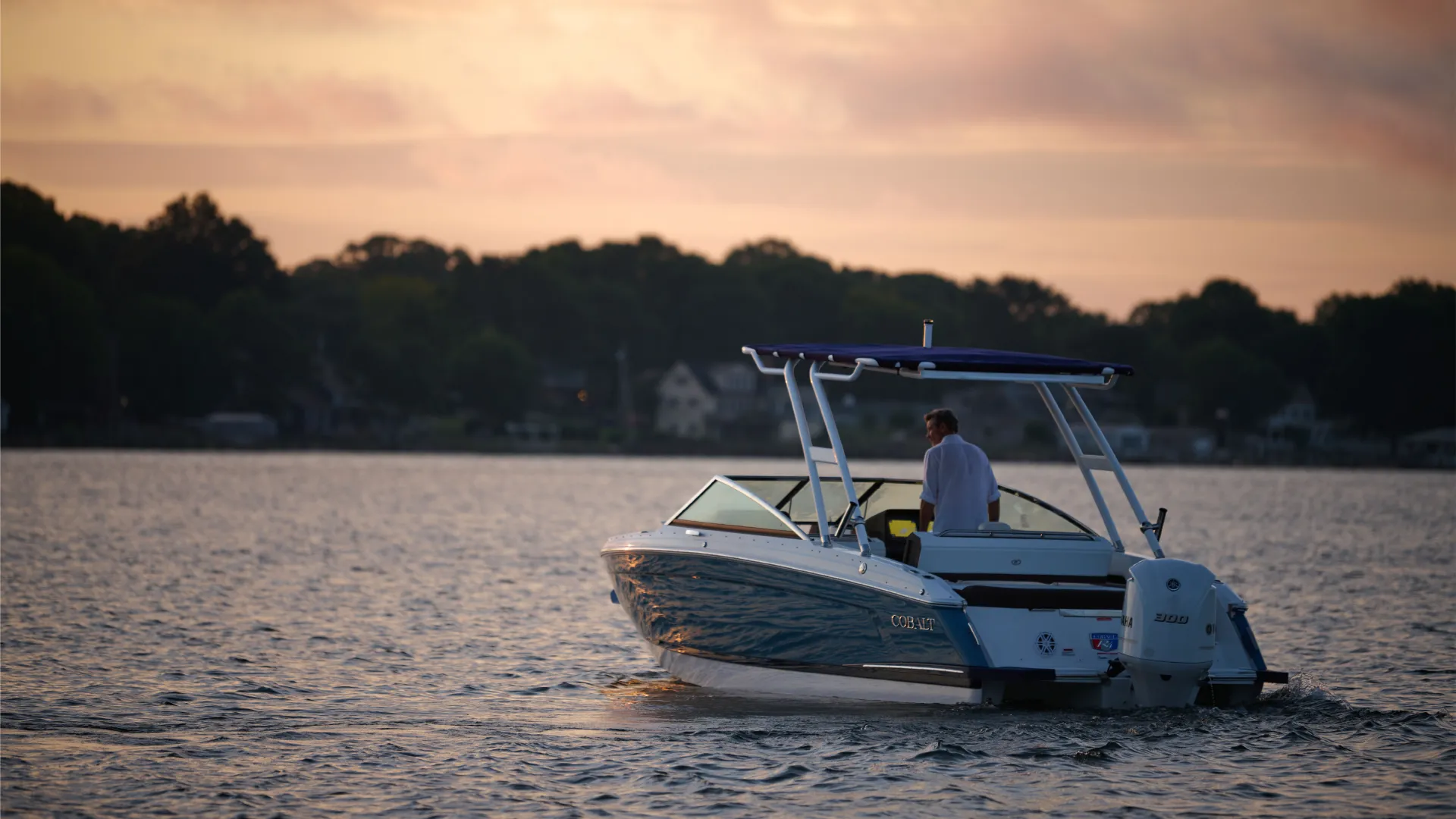 driving boat into distance