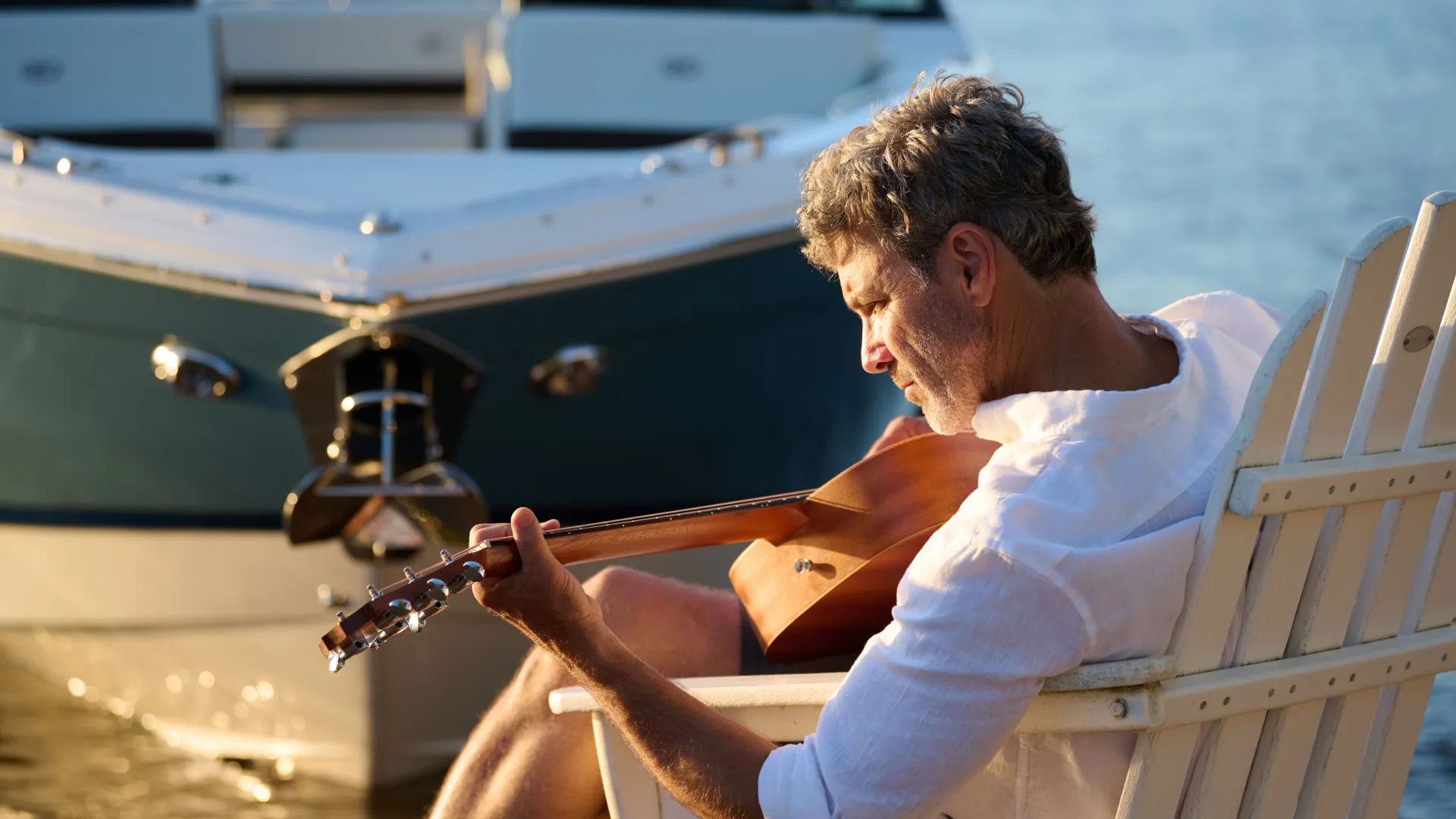 Guy playing guitar