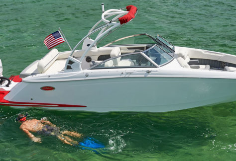 Cobalt SC Series 25 SC in White and Knockout Red with Snorkler Nearby