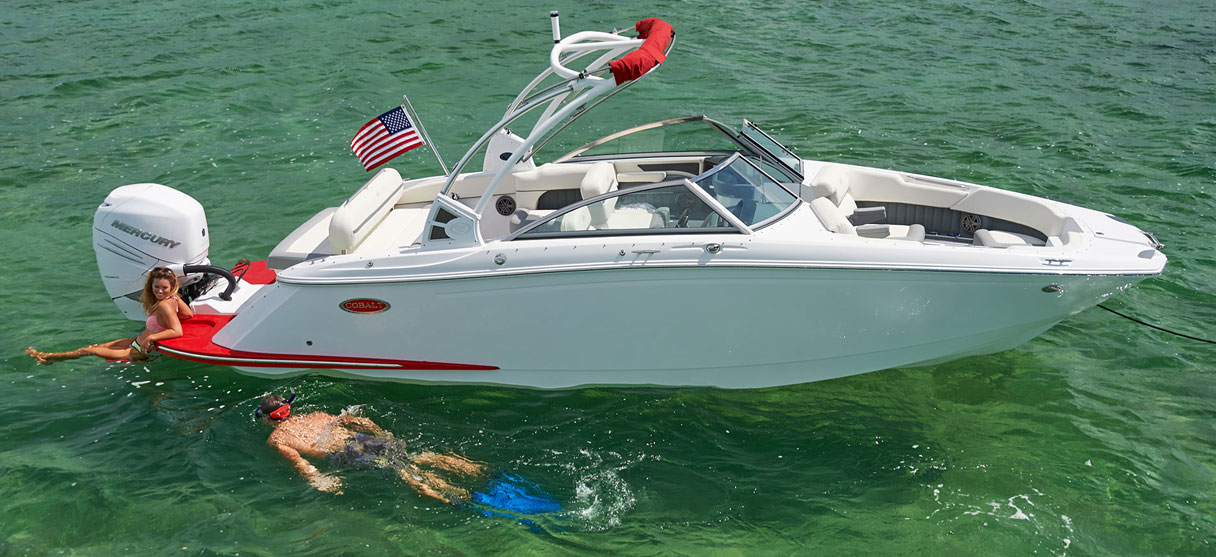 Cobalt SC Series 25 SC in White and Knockout Red with Snorkler Nearby